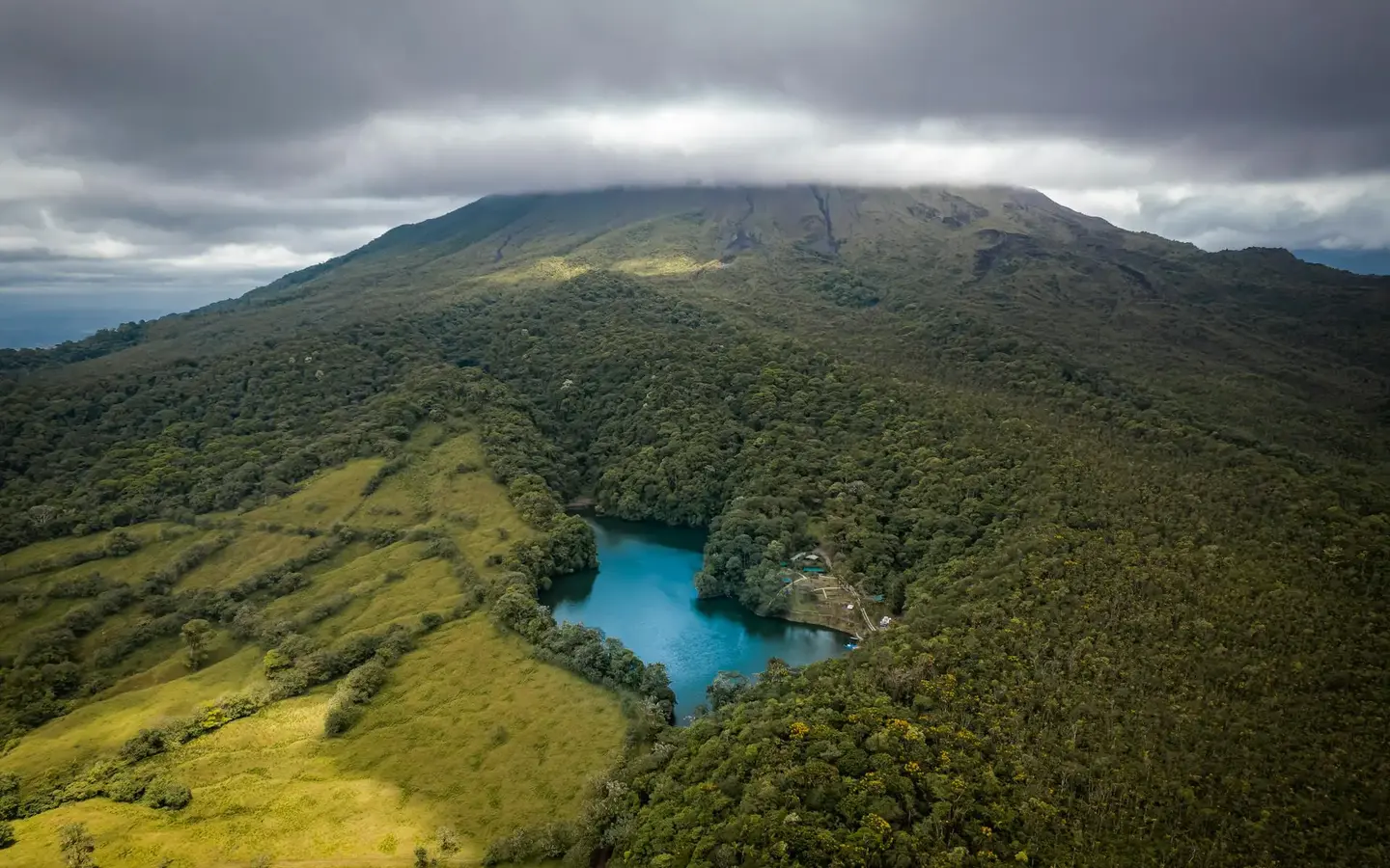 Aerial view of Arenal Volcano surrounded by tropical rainforest, Costa Rica
