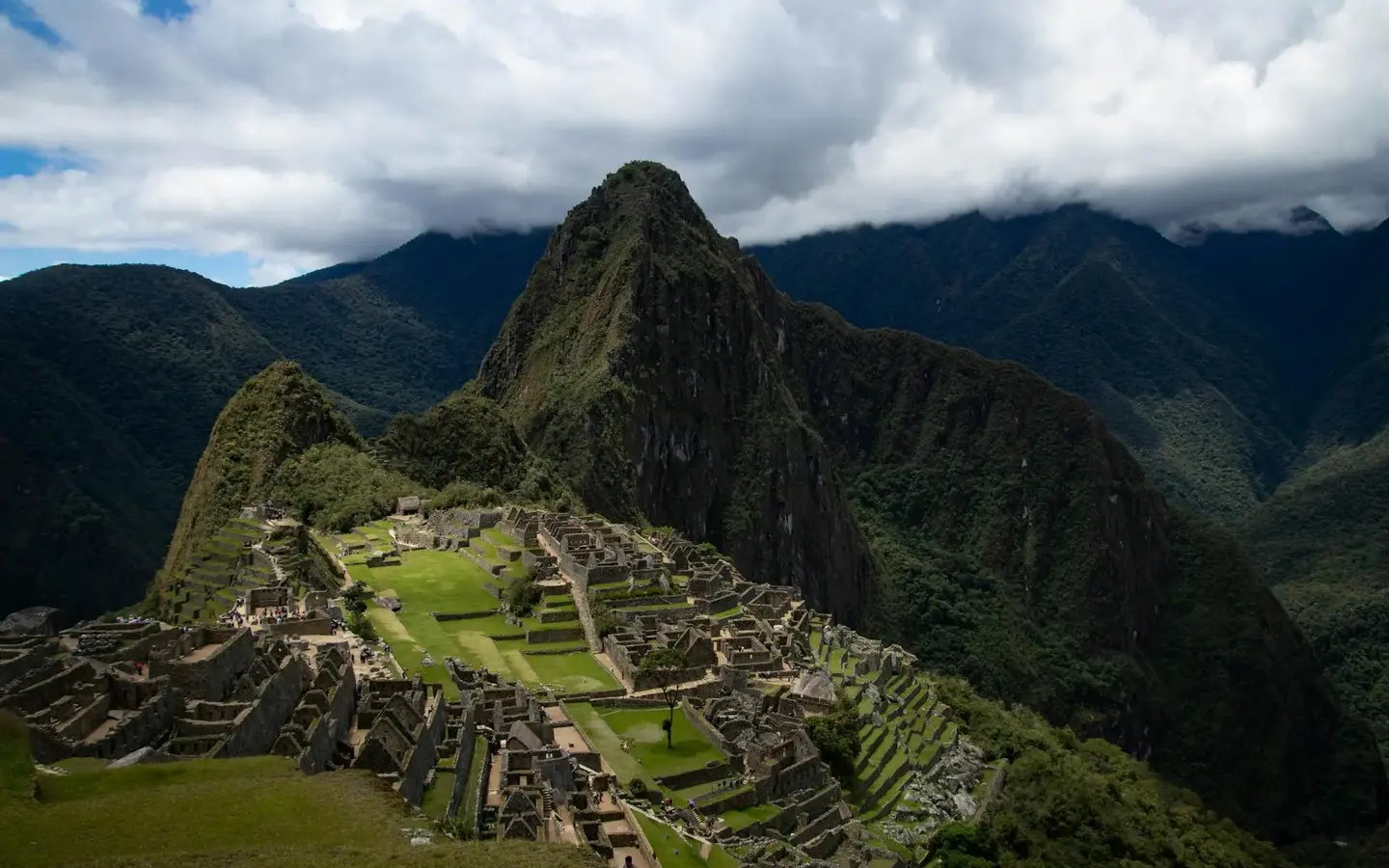 Machu Picchu citadel emerging from morning mist along the Inca Trail
